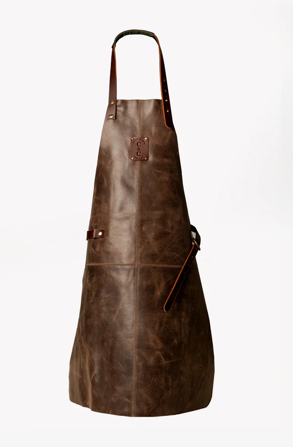 Dark brown buff leather apron with adjustable waist belt and neck strap, flame and spark resistant, durable workshop and grilling apron