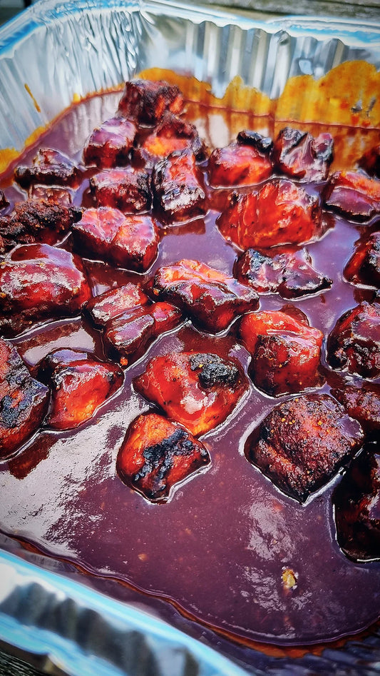 Pork belly burnt ends with orange zest & maple sauce