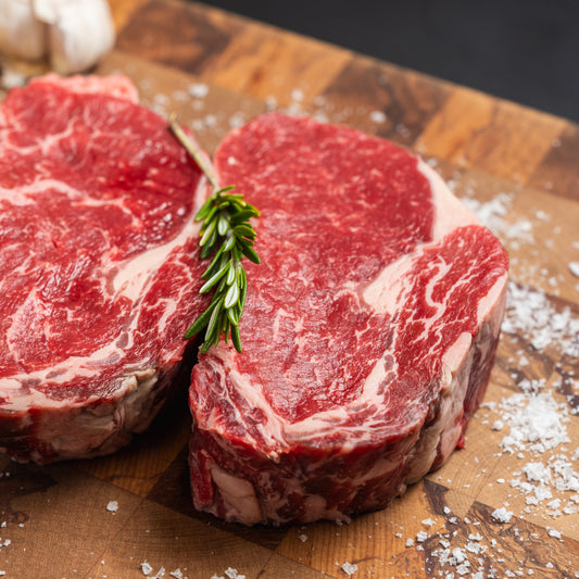 Two 200g 28 day aged 100% NZ grass-fed scotch fillet steaks – premium, tender, and flavourful

